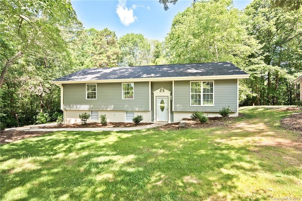 Completely renovated, 3 bedroom, 2 bath home on 1.53 acres (3 parcels combined) with no HOA & blocks to Lake Norman with community boat access!
