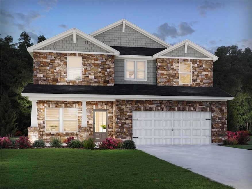 Craftsman-style home with stone siding, a front lawn, driveway, and an attached garage