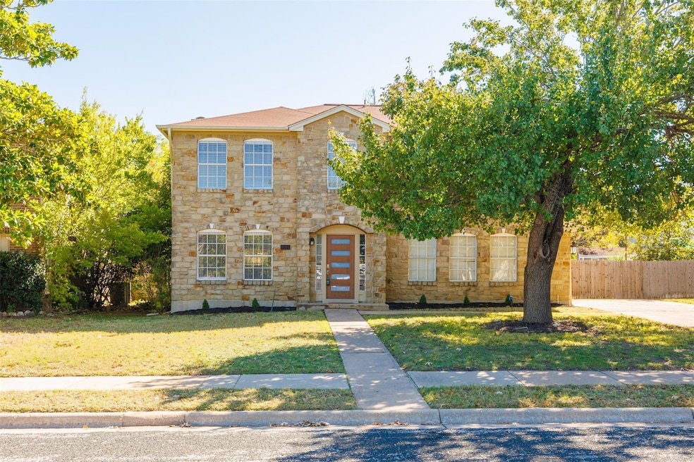 View of front of home featuring stone siding