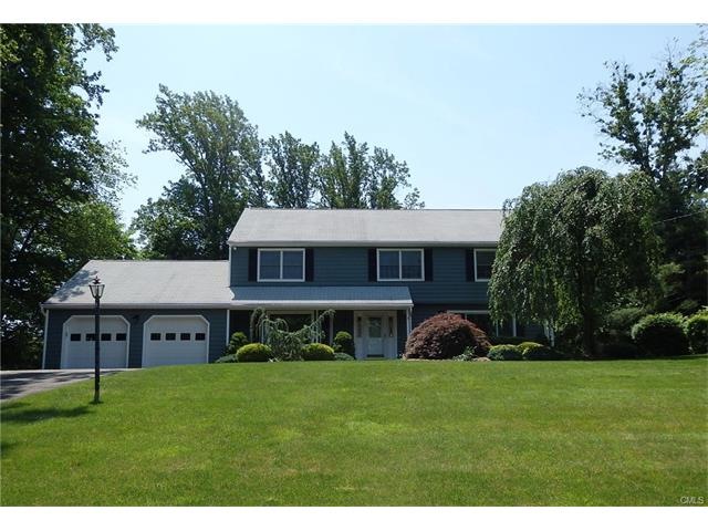 8 Sunbeam Drive nestled on a lush, picturesque and