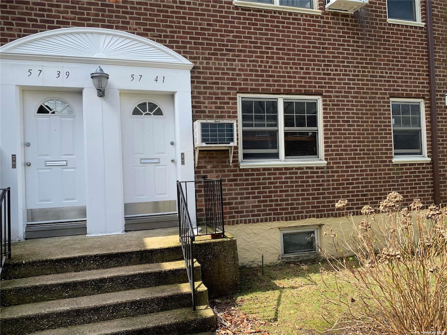 5741 Marathon Pkwy unit 315, Little Neck, NY 11362 - photo 1