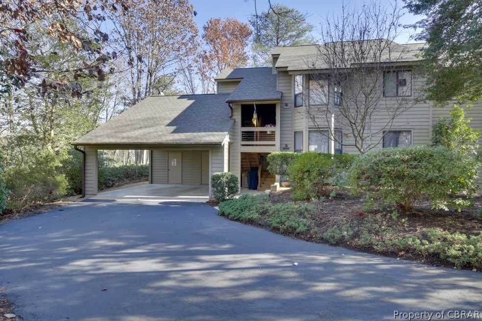 First floor, end unit condo/home with shared carpo