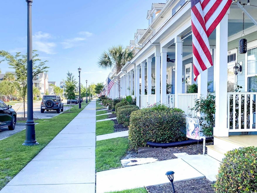 View of community with a yard