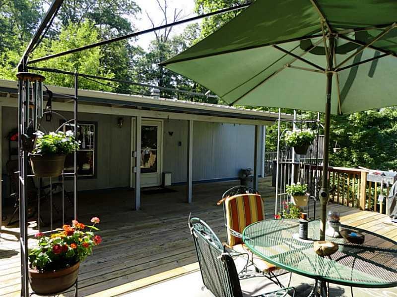 Patio/Deck. Enjoy bbq s and privacy on your spacious deck