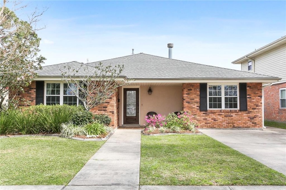 Live by the lake in this single story ranch home