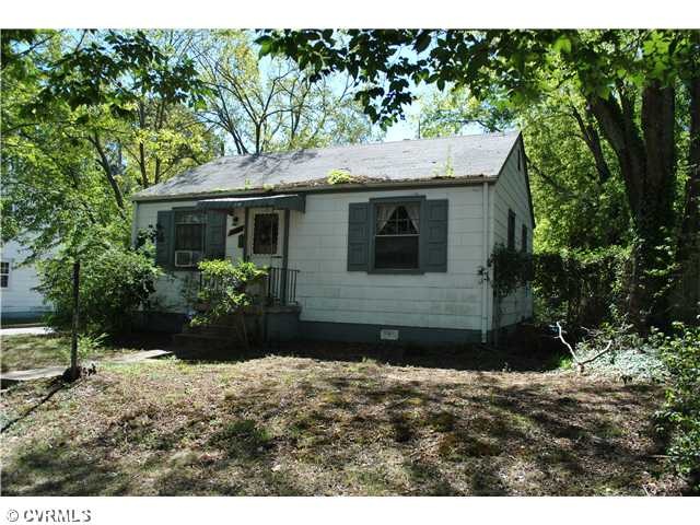 Exterior Front - Corner Lot home with detached 3 c