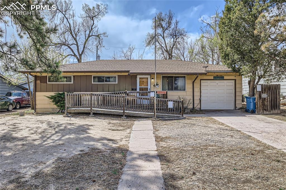 Single story home featuring driveway, a shingled r