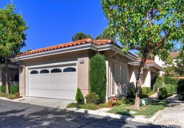  Attached 2 car garage with private side walk way.