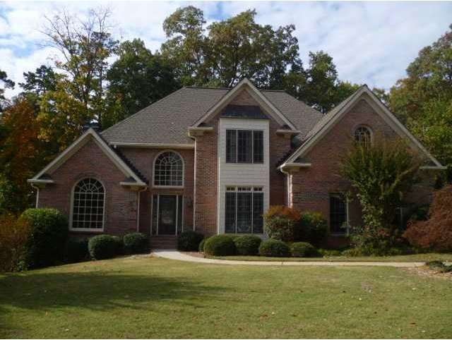 Exterior Front. Three Sides Brick