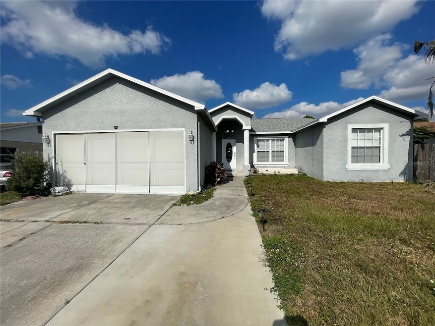 3103 Muir St, Holiday, FL 34691 - photo 1