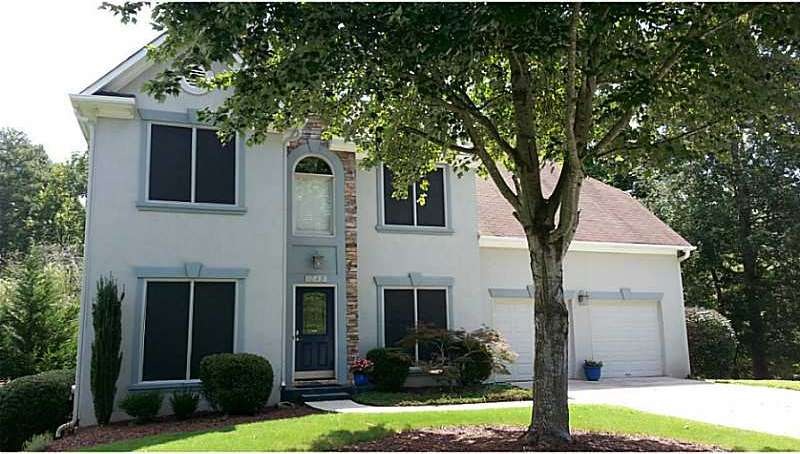 Exterior Front. Hardcoat front stucco, hardiplank-