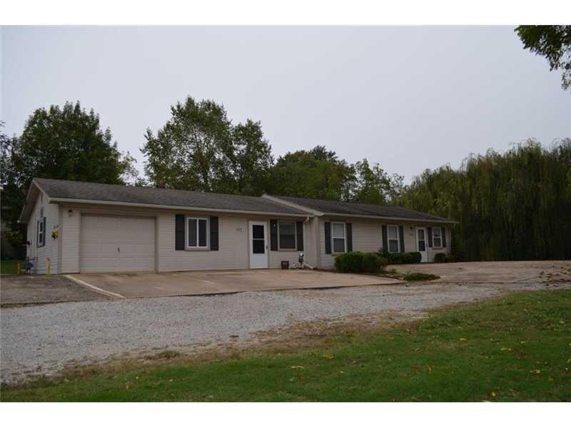 Exterior Front. 311 and 313