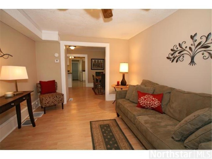 Charming NE home has open floor plan and lots of u