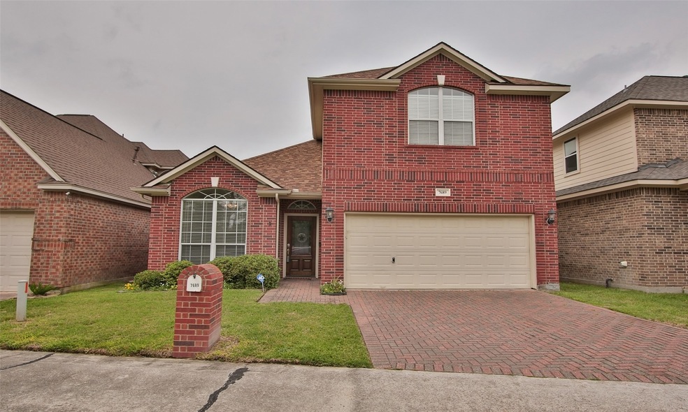 7689 Ameswood Rd, Houston, TX 77095 - photo 1