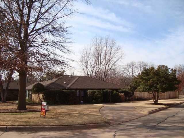 Exterior Front. Corner Lot, Circle Drive, Sprinkle