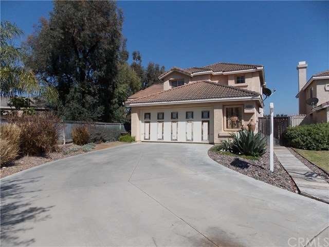 Extra long driveway with home at end of cul-de-sac
