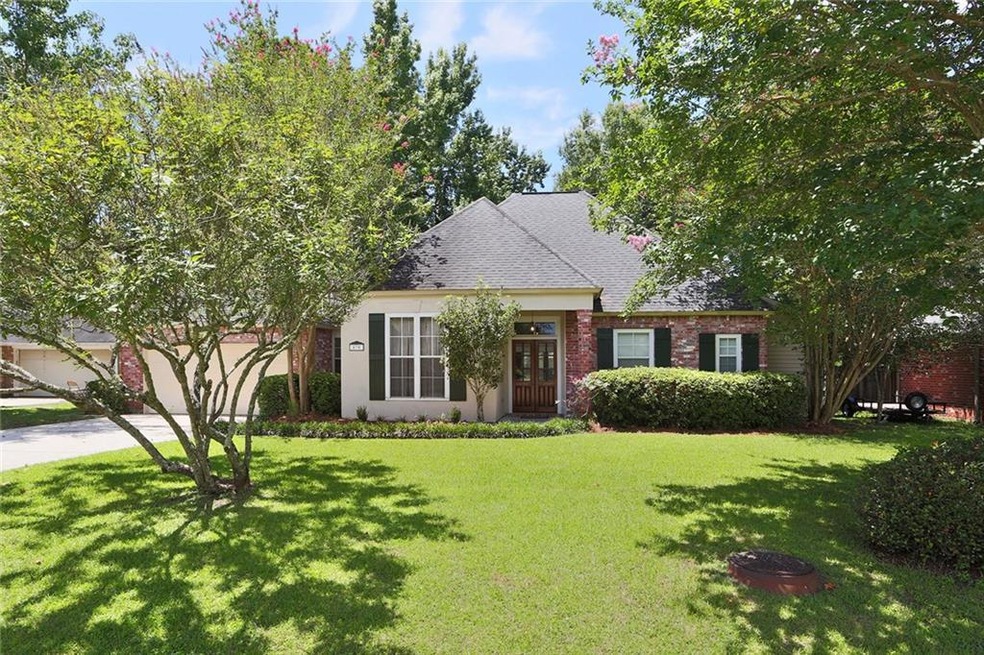 Beautifully landscaped front yard with a welcoming