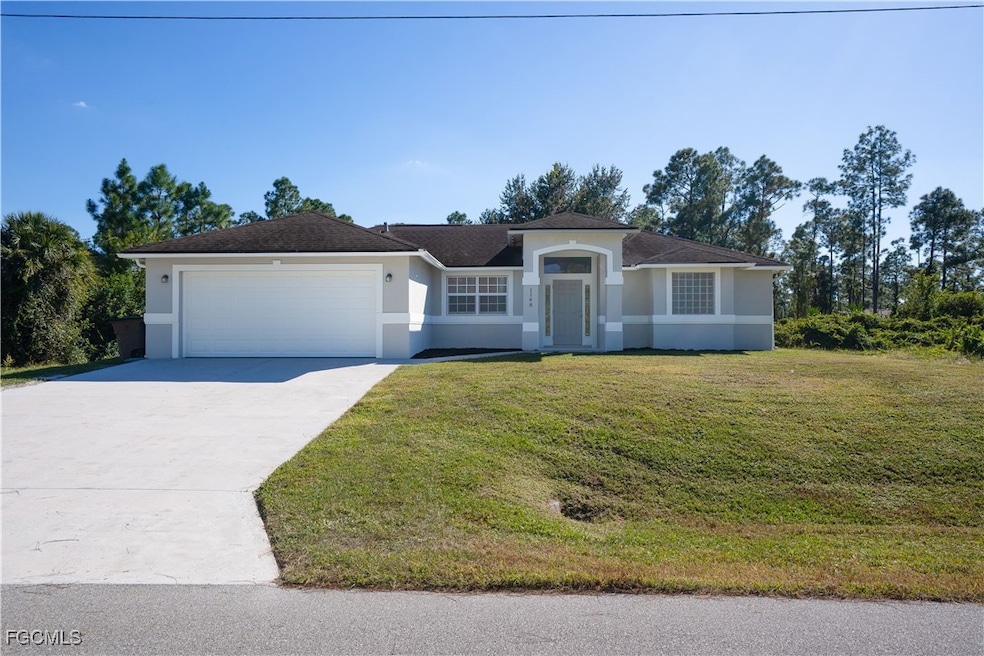 1148 Dutchess St E, Lehigh Acres, FL 33974 - photo 1