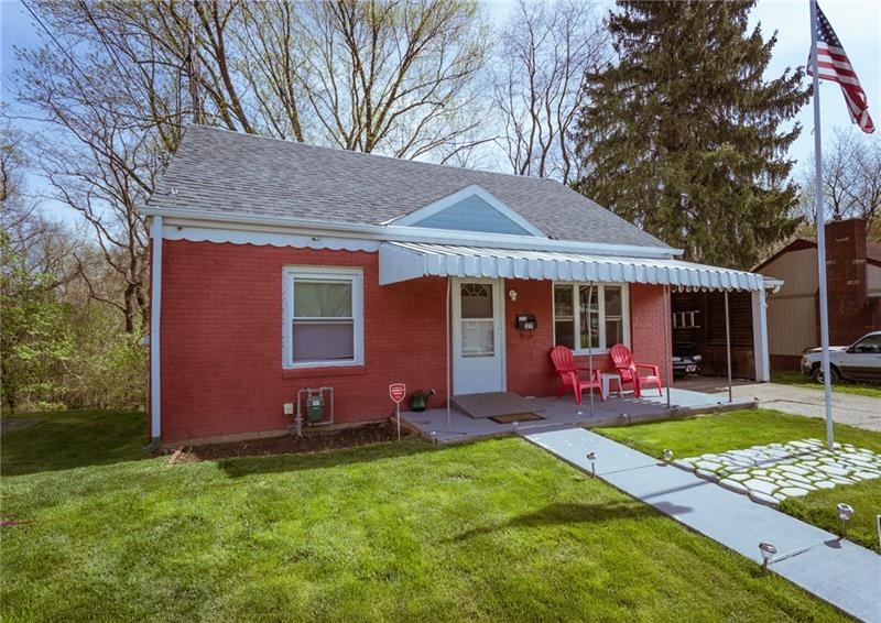 NICELY LANDSCAPED FRONT YARD, MAKE THIS YOUR HOME!