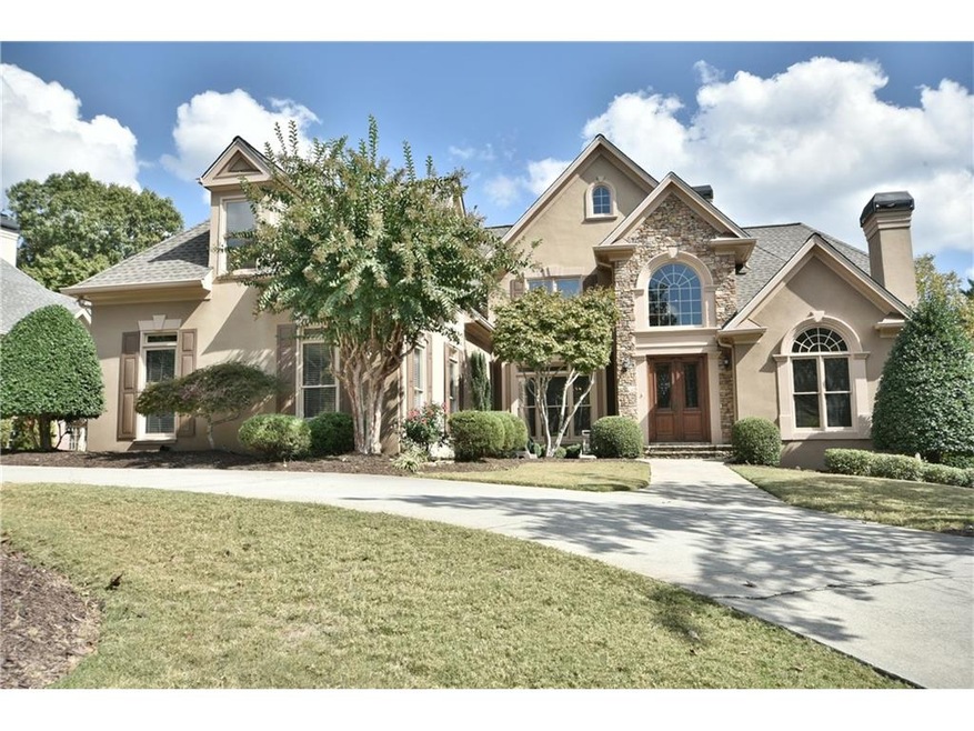WELCOME HOME!  THIS LUXURIOUS hardcoat stucco and 