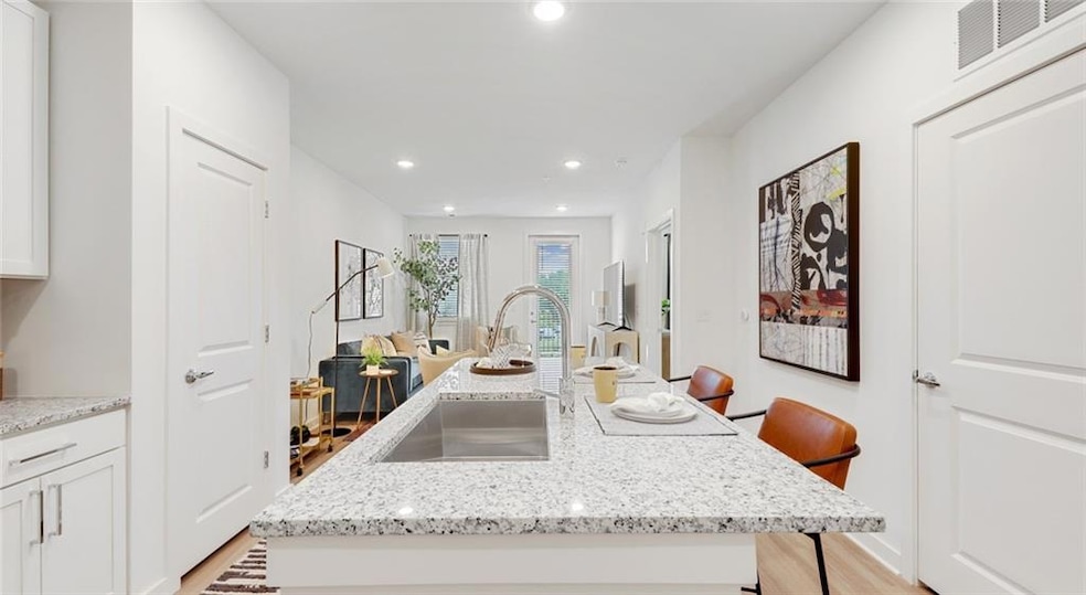 Kitchen featuring light hardwood / wood-style floo