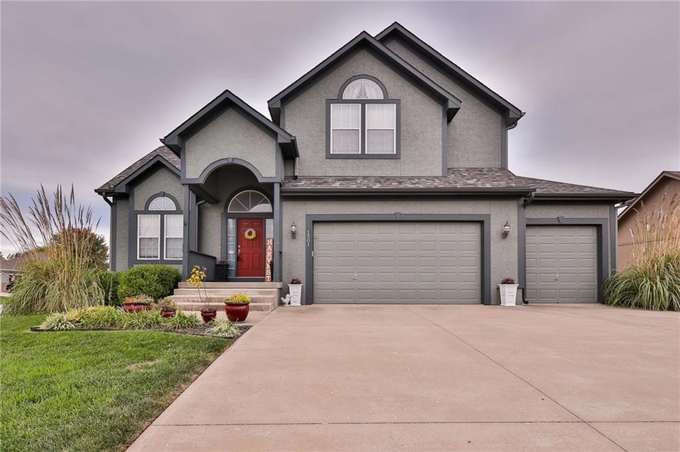 1501 Drury Cir, Raymore, MO 64083 - photo 1