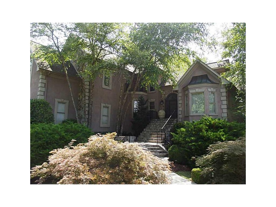 Exterior Front. Established landscape does the tri