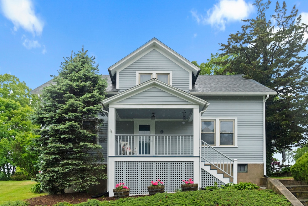 Charming coastal Cape nestled just steps from the harbor. Featuring classic New England curb appeal, a covered front porch, and lush mature landscaping, this home invites you to relax and enjoy seaside living at its finest.
