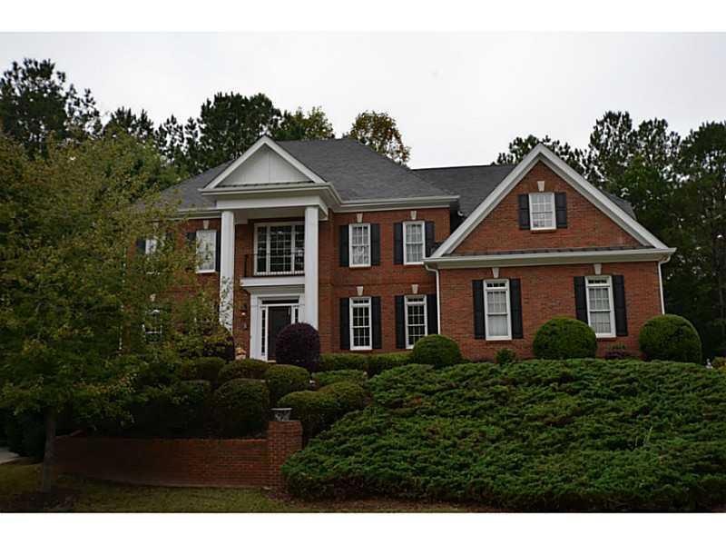 Exterior Front. Four sides brick ~