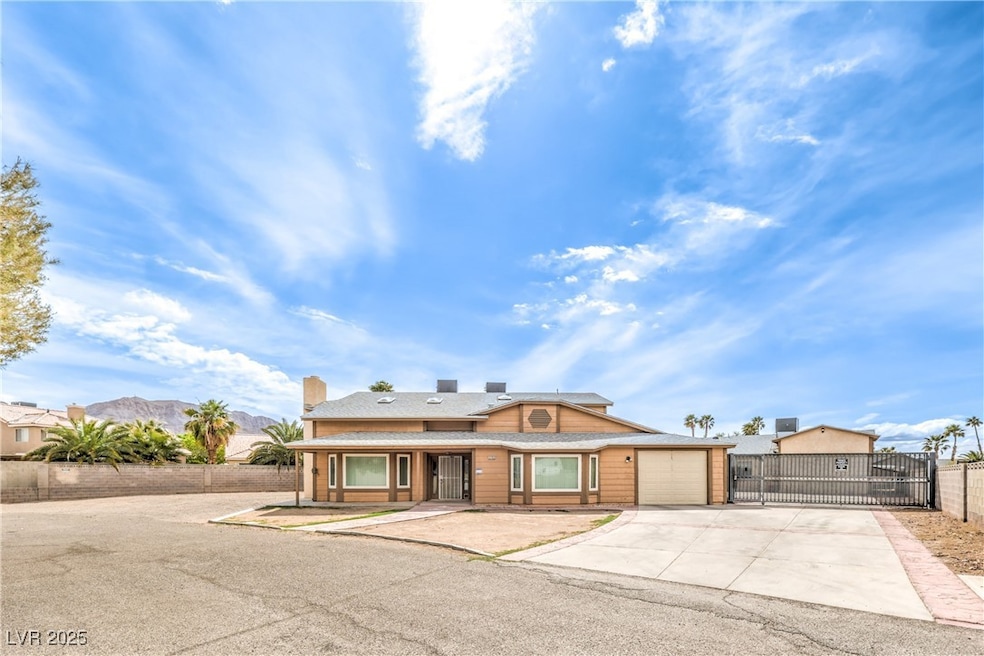 View of front of property featuring concrete drive