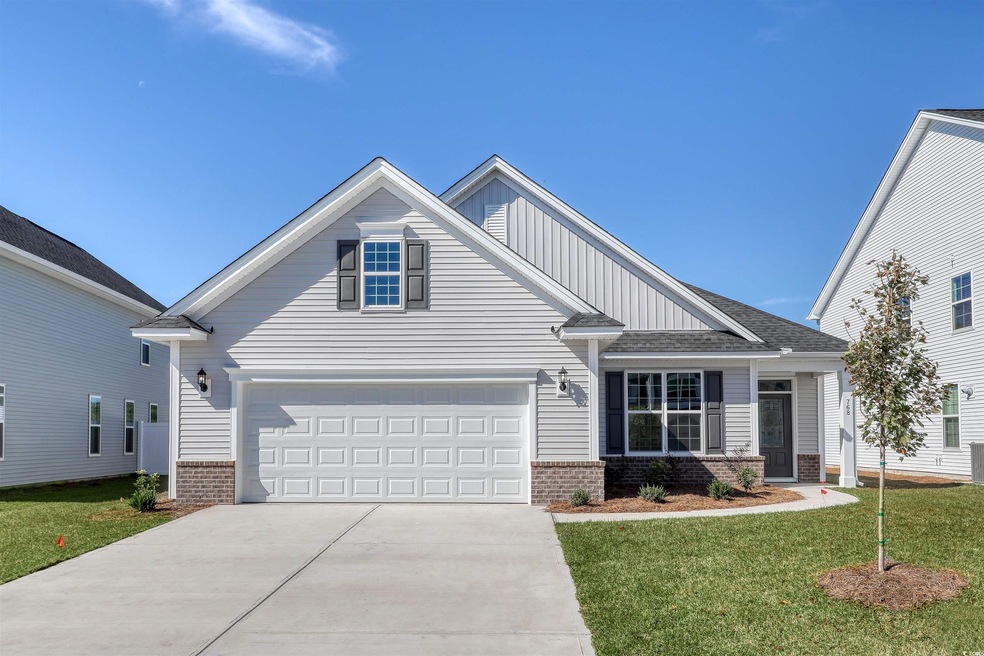 View of front facade featuring a front yard and a 