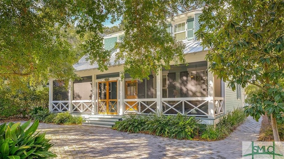 Nestled under the canopy of a large oak tree this 