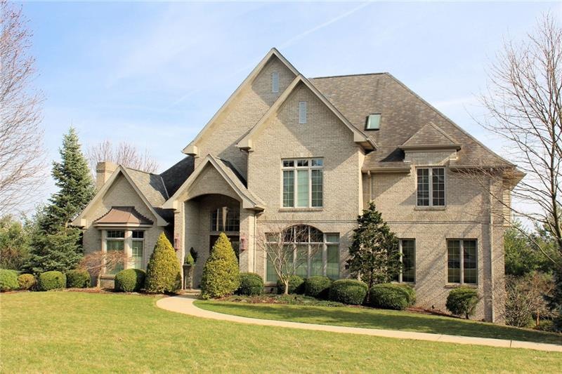 Living in the sought-after Country Brook neighborh