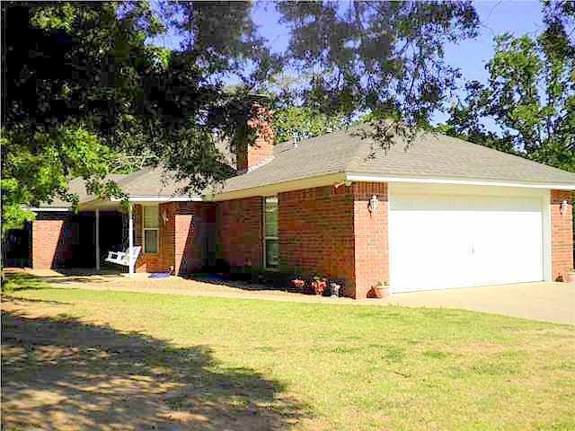 Exterior Front. view of front and side garage