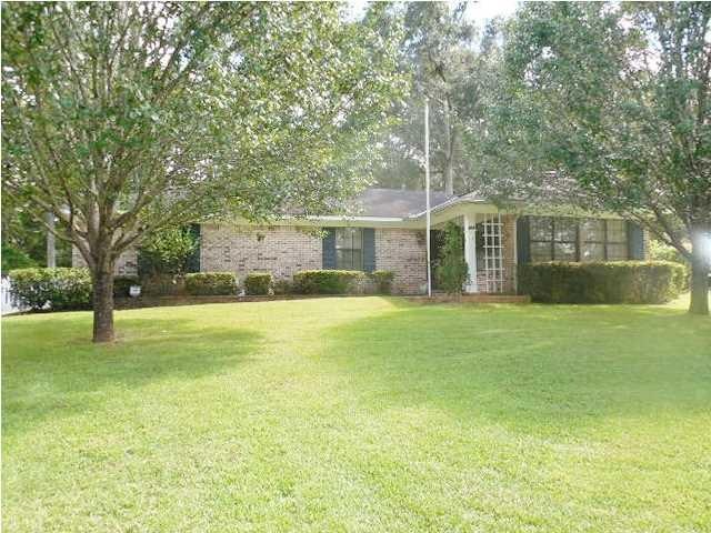 Welcome to 5683 Woodchase Circle This custom built