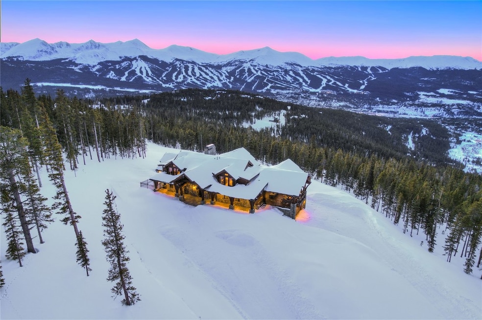 Snowy aerial view featuring a mountain view