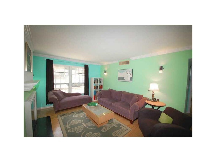 Living Room. Hardwood Floors and Upgraded Lighting