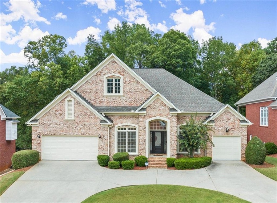 View of front of house with two garages