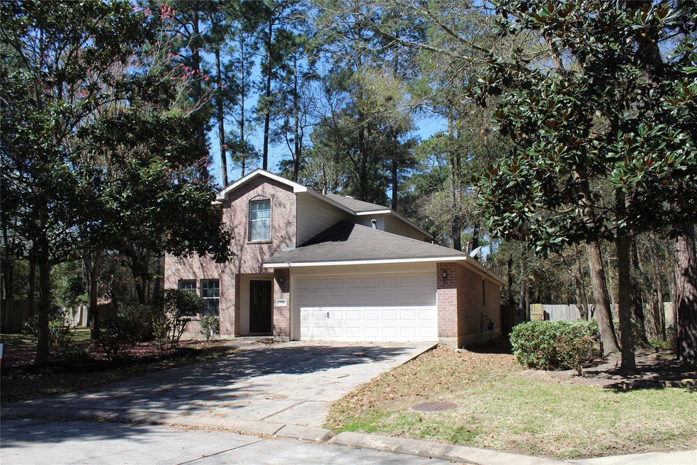 Home sits on large cul de sac lot surrounded by mature trees