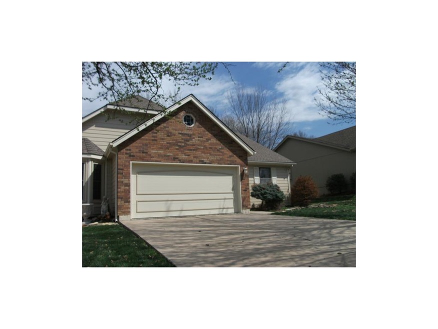 Front exterior with 2 car garage.