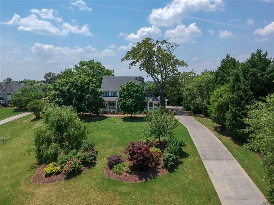 Large Front Yard and Long Driveway