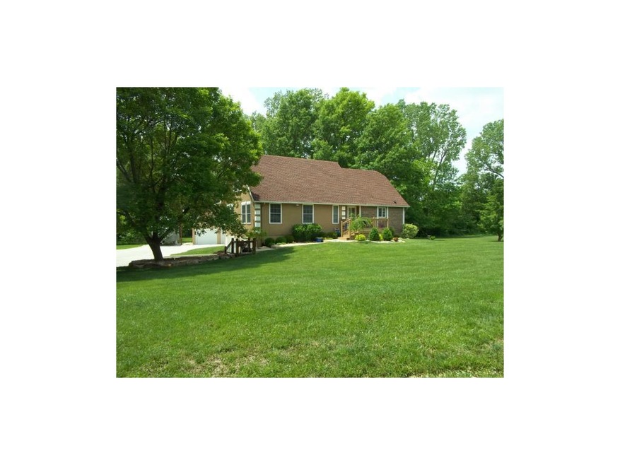 Beautiful updated 1.5 story home on 3 +/- acres of