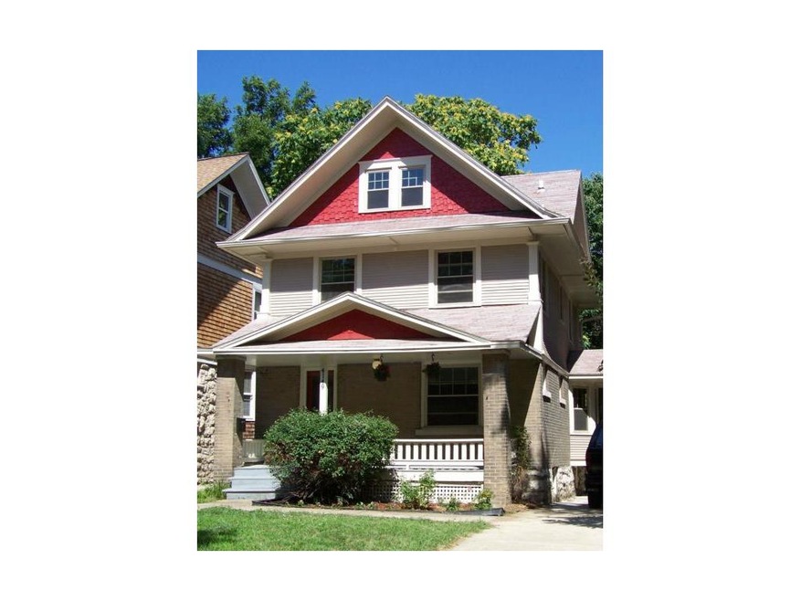 Front of home.  Three stories, big porch, new stor
