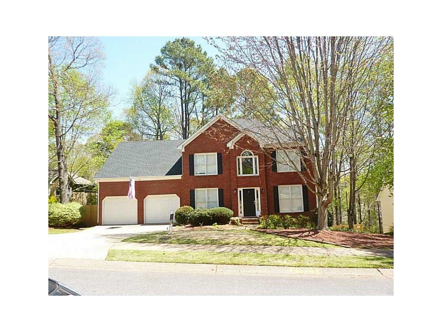 Exterior Front. Stately brick front with great cur