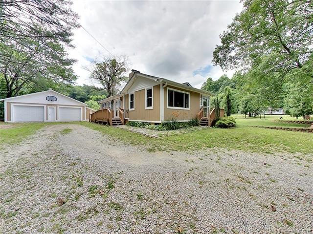 Front of home, with ramped side entrance. Two car 