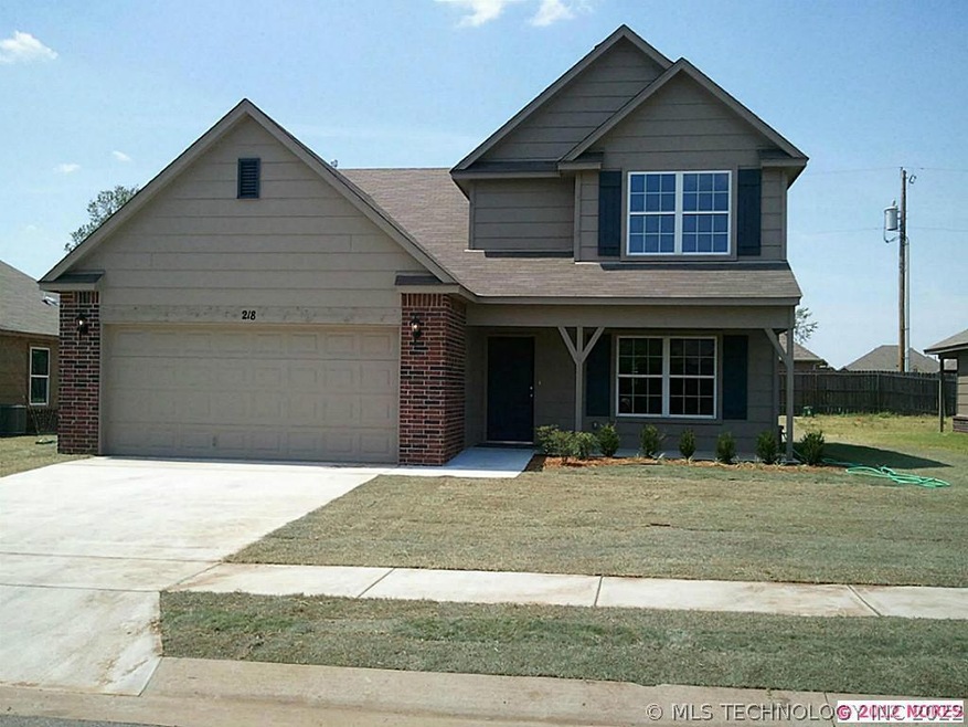 Front of home looking West.