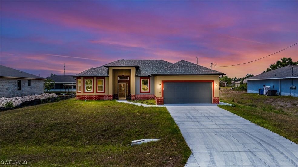Prairie-style home featuring a yard, central air c