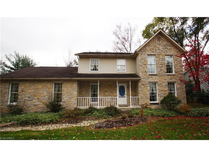 charming curb appeal with stone front is very welc