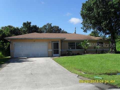 1021 Tropical Ave NW, Port Charlotte, FL 33948 - photo 1