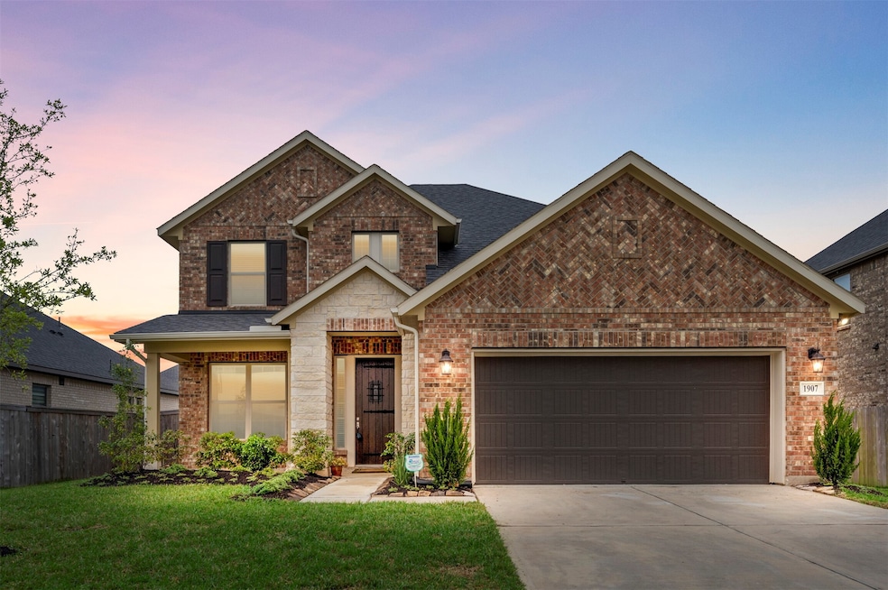 1907 Orchard Berry Lane is located in the heart of Young Ranch, within walking distance of the neighborhood recreation center with workout facility, park, and pool. The curb appeal of this home has been enhanced with professional landscaping leading to the welcoming front porch. An automatic sprinkler system was added to make lawn maintenance a breeze year-round.